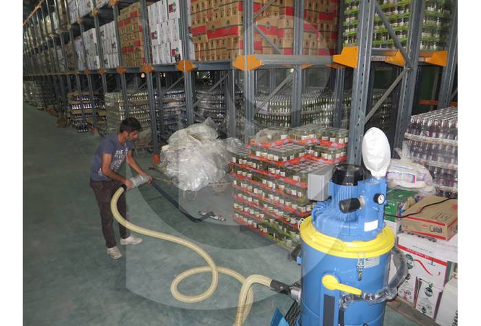 cleaning food warehouse by industrial vacuum 